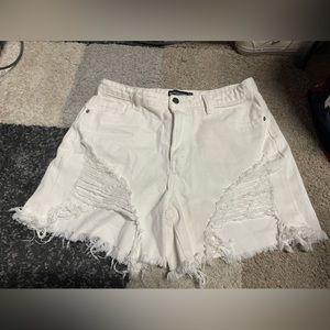 White distressed jean shorts